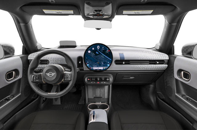 Inside view of a 2026 MINI Hardtop 4 Door interior with a round digital display and stylish dashboard.