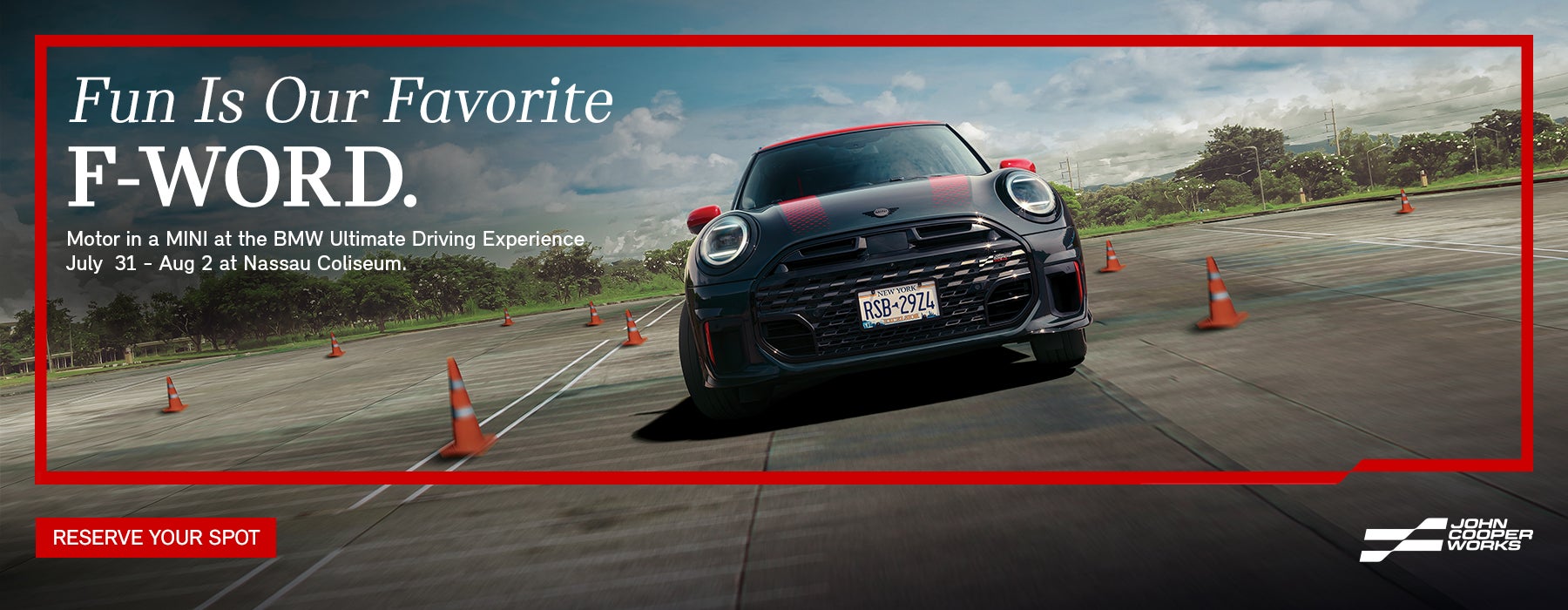 Black JCW driving.